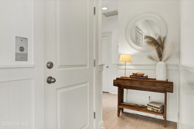 interior space featuring visible vents and wood finished floors