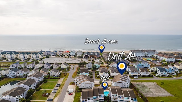 bird's eye view with a residential view and a water view