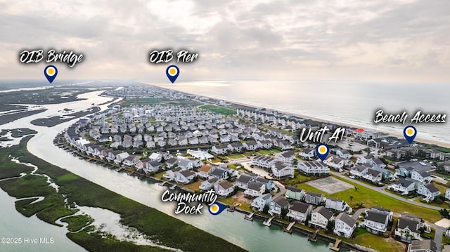 aerial view featuring a residential view and a water view