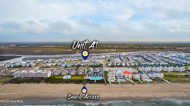 aerial view featuring a residential view and a water view