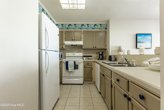 kitchen featuring white appliances, light tile patterned floors, under cabinet range hood, light countertops, and a sink