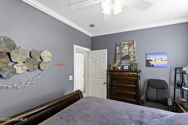 bedroom featuring a ceiling fan and crown molding