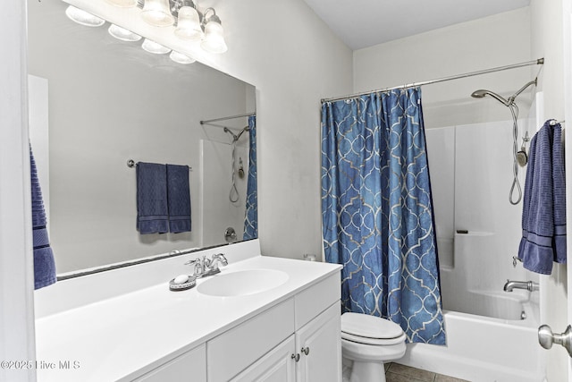 bathroom featuring shower / bath combo with shower curtain, toilet, tile patterned flooring, and vanity
