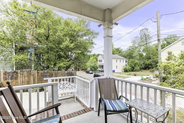 view of exterior entry featuring a porch