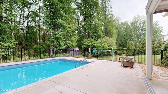 view of pool with fence, a patio area, and a fenced in pool