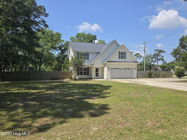 traditional-style house featuring driveway and a garage
