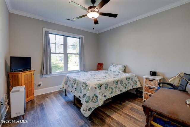 bedroom featuring ceiling fan, visible vents, crown molding, dark wood finished floors, and baseboards