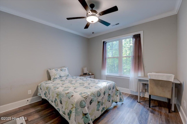bedroom with visible vents, ornamental molding, baseboards, and dark wood-type flooring