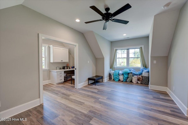 bonus room featuring recessed lighting, baseboards, light wood finished floors, and lofted ceiling