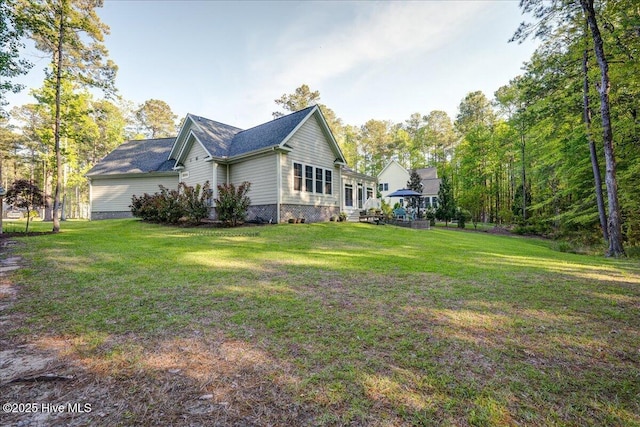exterior space with a yard