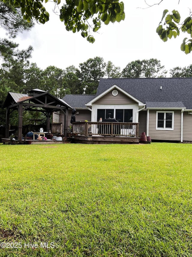 117 Foster Creek Ct, Swansboro, NC 28584 - kitchen with open shelves, wood finished floors, a sink, black appliances, and white cabinetry