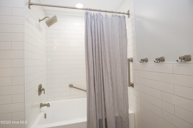 bathroom featuring shower / bathtub combination with curtain