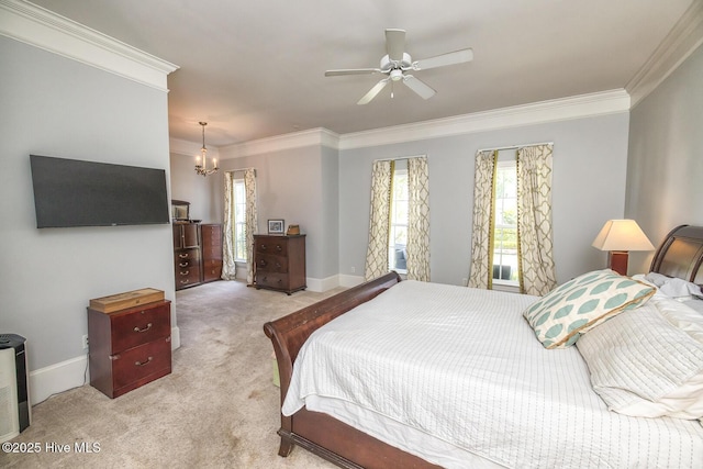 bedroom featuring light colored carpet, ornamental molding, baseboards, and multiple windows