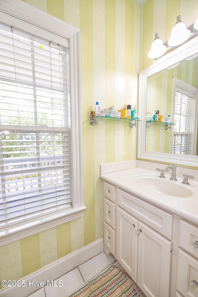 bathroom featuring wallpapered walls, tile patterned floors, and vanity