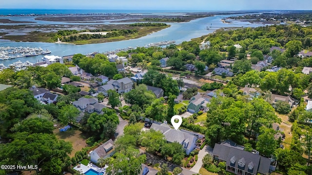aerial view with a water view and a residential view