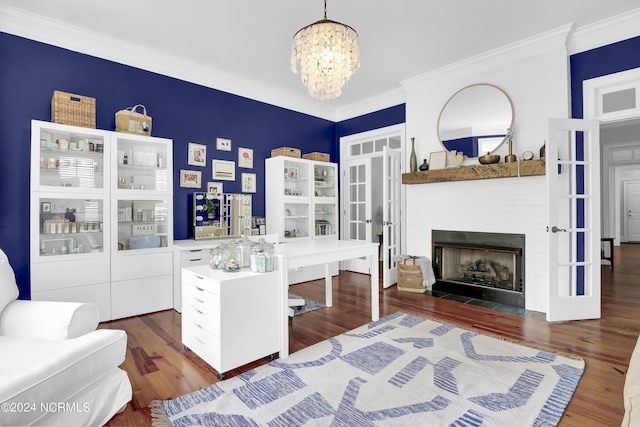 office featuring wood finished floors, crown molding, and a chandelier