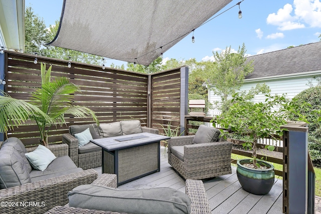 wooden terrace featuring an outdoor living space
