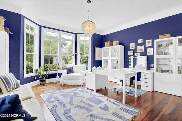 office area featuring ornamental molding, a notable chandelier, and wood finished floors