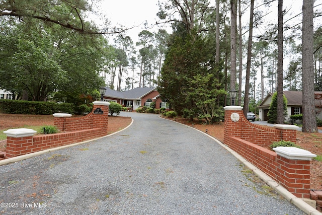 21 Birdie Dr, Whispering Pines, NC 28327 - view of road featuring driveway