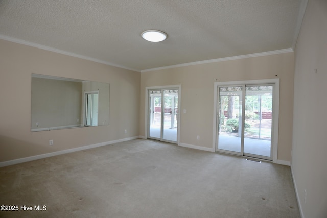 21 Birdie Dr, Whispering Pines, NC 28327 - unfurnished room with crown molding, baseboards, carpet, and a textured ceiling