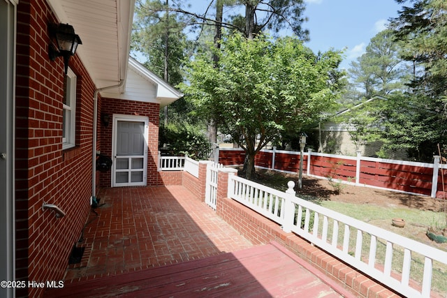 21 Birdie Dr, Whispering Pines, NC 28327 - wooden deck featuring fence