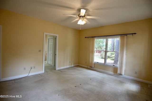 21 Birdie Dr, Whispering Pines, NC 28327 - unfurnished room with baseboards, ceiling fan, and carpet