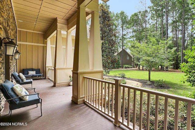 balcony with an outdoor hangout area and a porch