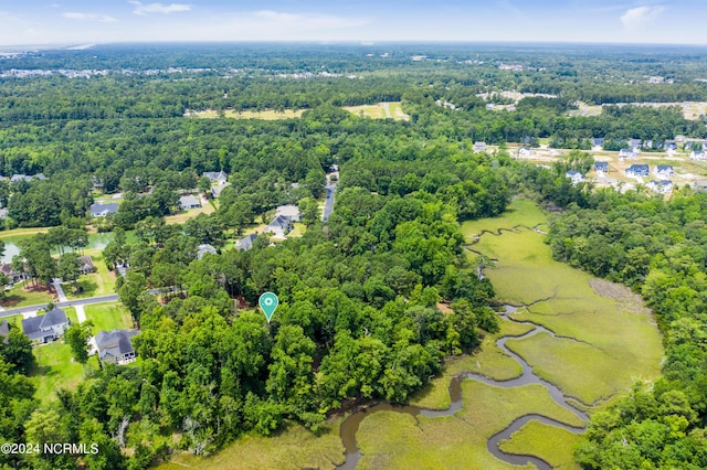 drone / aerial view with a view of trees