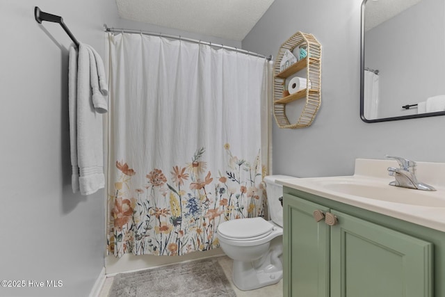bathroom featuring tile patterned flooring, toilet, vanity, a shower with shower curtain, and a textured ceiling