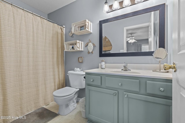full bath featuring a ceiling fan, vanity, and toilet