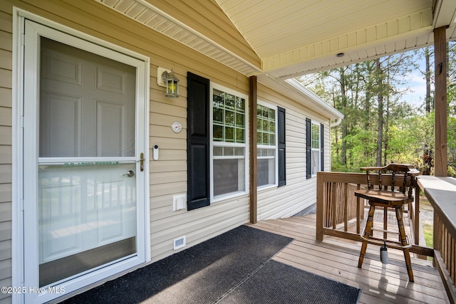 deck with covered porch