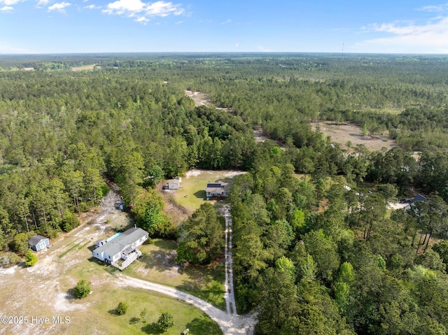 aerial view featuring a view of trees