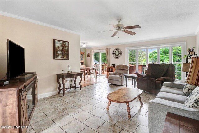 105 Harbor Dr, Washington, NC 27889 - living room with crown molding, a ceiling fan, light tile patterned floors, and baseboards