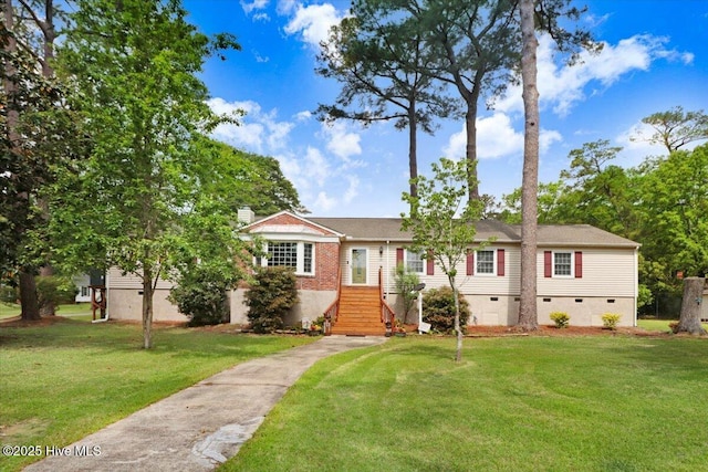105 Harbor Dr, Washington, NC 27889 - view of front of property featuring a front yard, crawl space, and a chimney