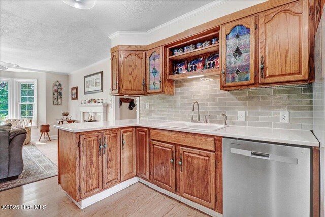 105 Harbor Dr, Washington, NC 27889 - kitchen featuring a textured ceiling, a peninsula, dishwasher, and a sink