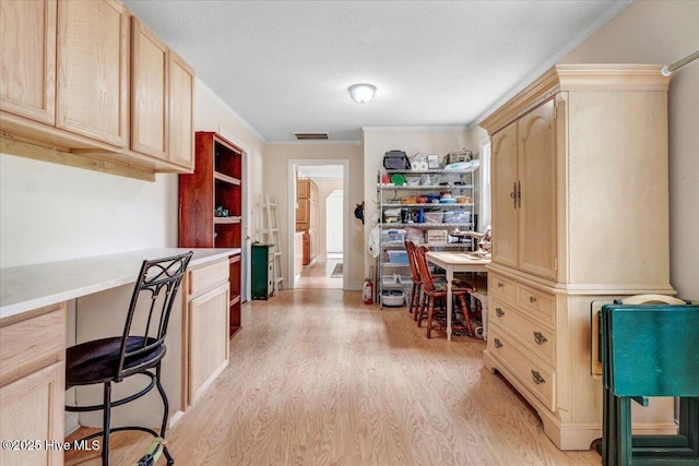 105 Harbor Dr, Washington, NC 27889 - office space featuring light wood-type flooring, built in desk, and ornamental molding