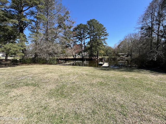 105 Harbor Dr, Washington, NC 27889 - view of yard featuring a water view and a boat dock