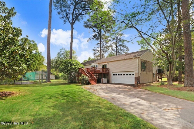 105 Harbor Dr, Washington, NC 27889 - ranch-style house with a deck, stairway, fence, driveway, and a front lawn