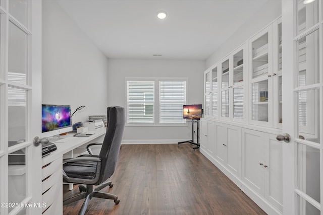 home office with recessed lighting, visible vents, baseboards, and dark wood-type flooring
