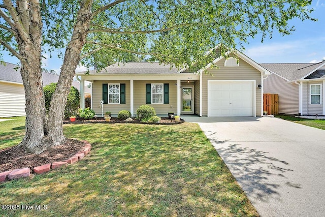 1005 Bellmark Ct, Leland, NC 28451 - ranch-style home featuring an attached garage, driveway, and a front yard