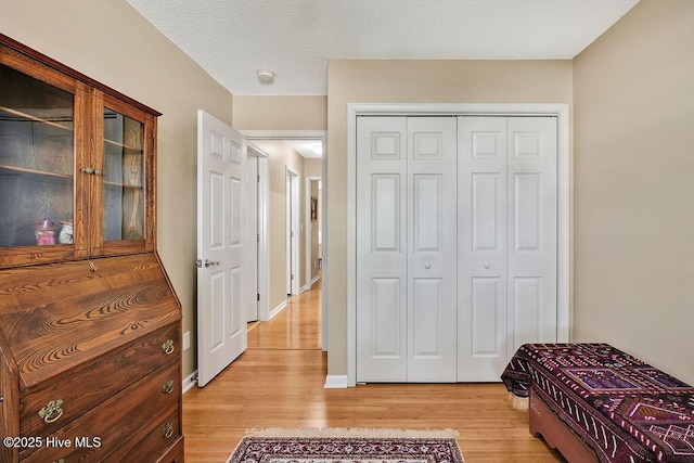 1005 Bellmark Ct, Leland, NC 28451 - bedroom featuring light wood-style floors and a closet