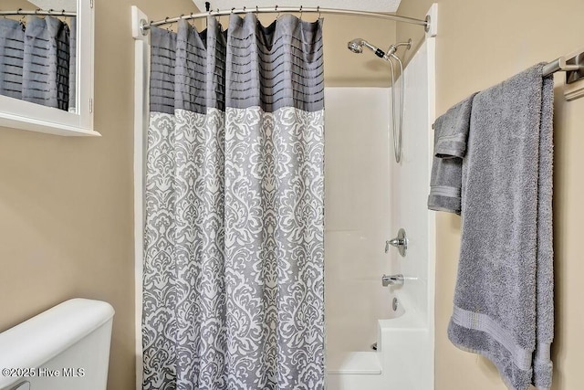 1005 Bellmark Ct, Leland, NC 28451 - bathroom featuring shower / bathtub combination with curtain and toilet