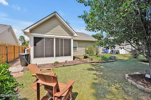 1005 Bellmark Ct, Leland, NC 28451 - rear view of property with a sunroom