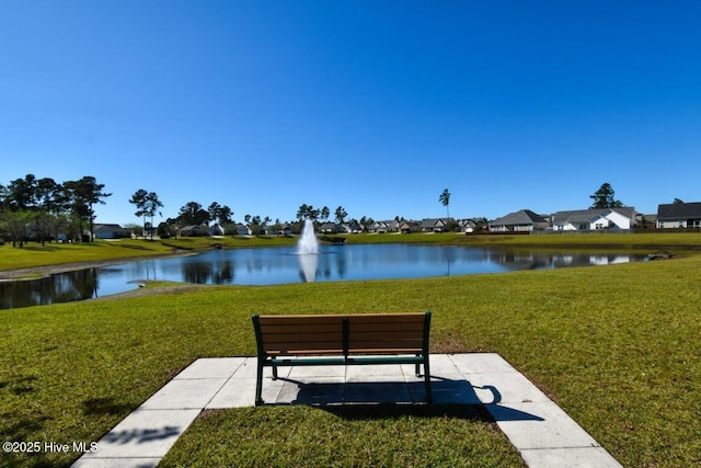 1005 Bellmark Ct, Leland, NC 28451 - view of community with a water view, a yard, and a residential view