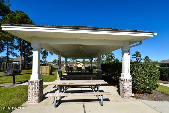 1005 Bellmark Ct, Leland, NC 28451 - view of home's community featuring a patio and outdoor dining area