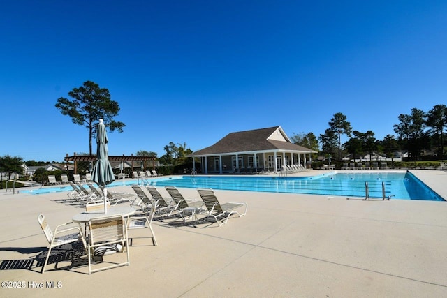 1005 Bellmark Ct, Leland, NC 28451 - community pool with a patio area