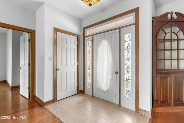 163 Middleton Dr, Hertford, NC 27944 - entrance foyer with light wood finished floors and baseboards