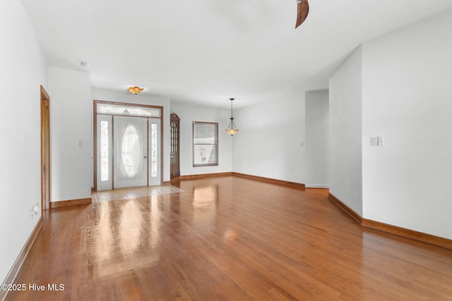 163 Middleton Dr, Hertford, NC 27944 - foyer featuring a ceiling fan, wood finished floors, and baseboards