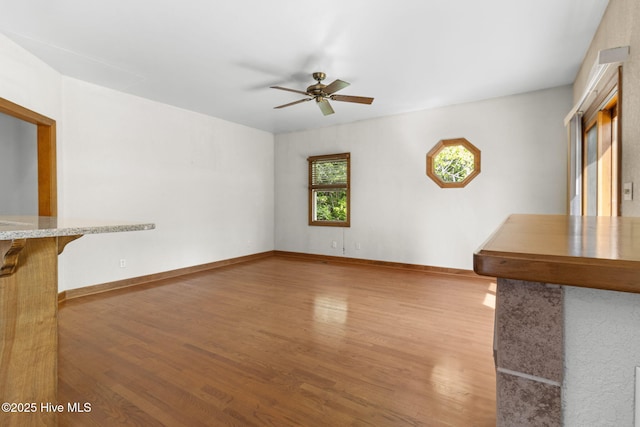 163 Middleton Dr, Hertford, NC 27944 - empty room featuring ceiling fan, wood finished floors, and baseboards