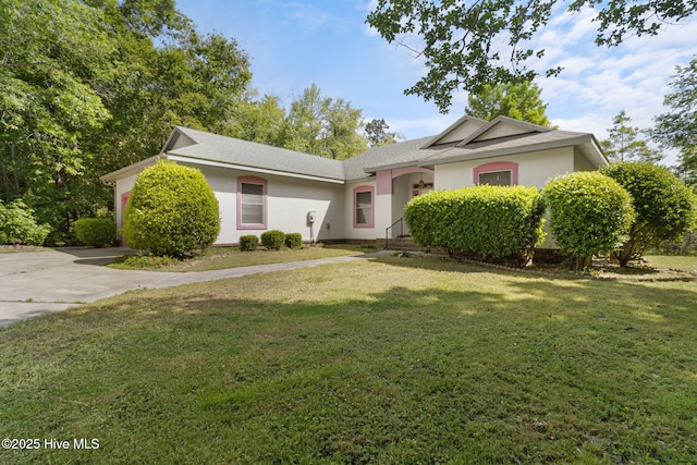 163 Middleton Dr, Hertford, NC 27944 - ranch-style house with a front lawn and stucco siding